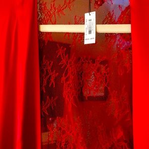 NWOT Victoria Secret red silk robe with lace. Very sexy for a special night. New